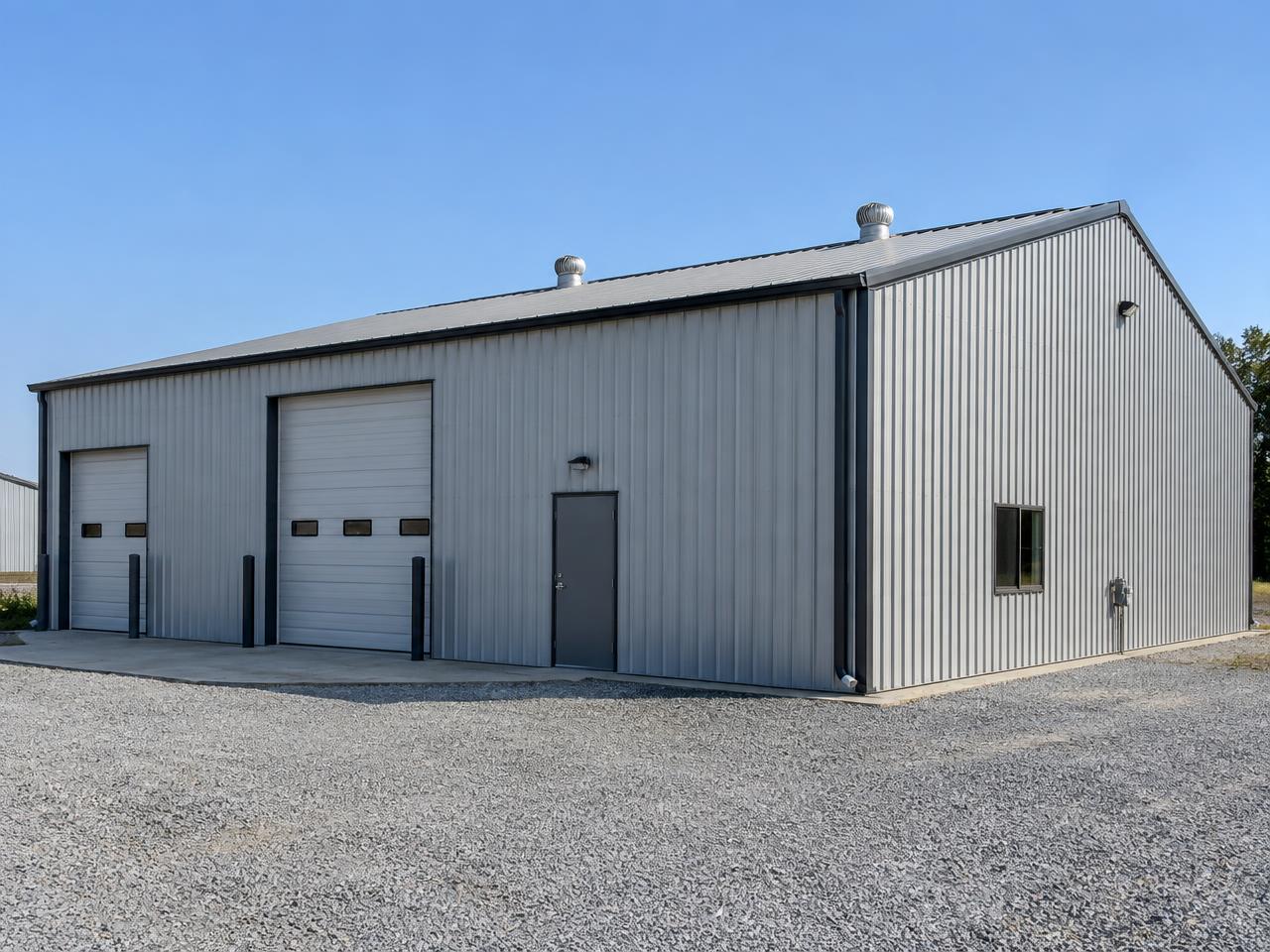 Representative photo of a pre-engineered steel metal building — placeholder imagery, not an Artisan Pole Barns Inc project